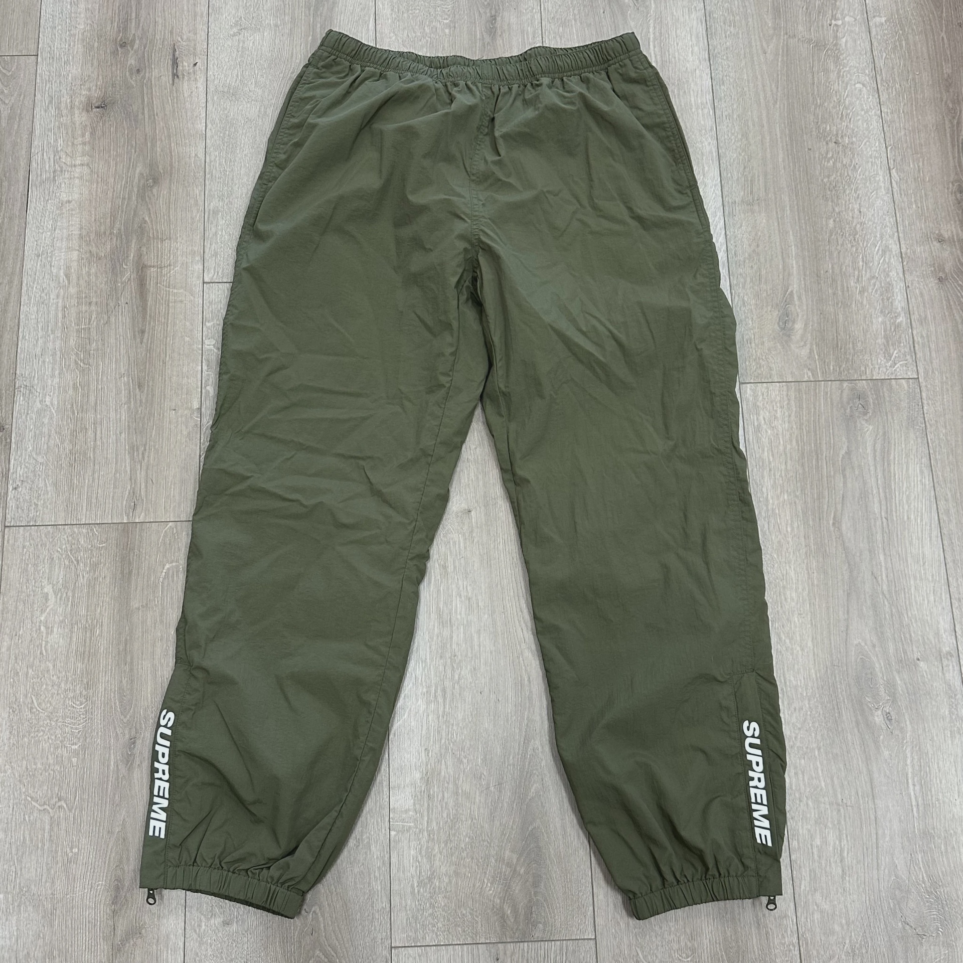 supreme windbreaker pants olive • Pre-Owned [1937]