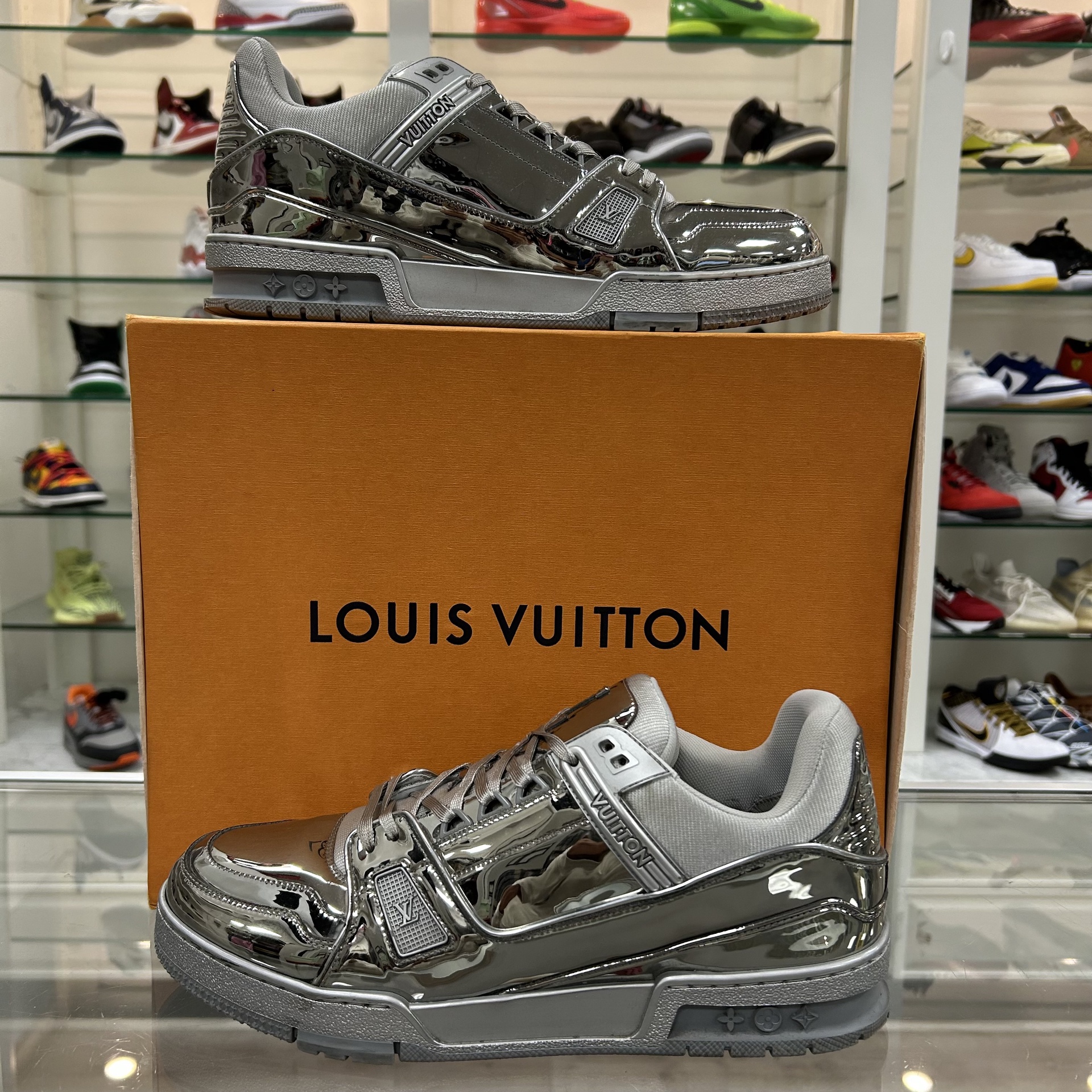 LOUIS VUITTON Silver Mirror LV Trainer Sneaker - Pre-Owned