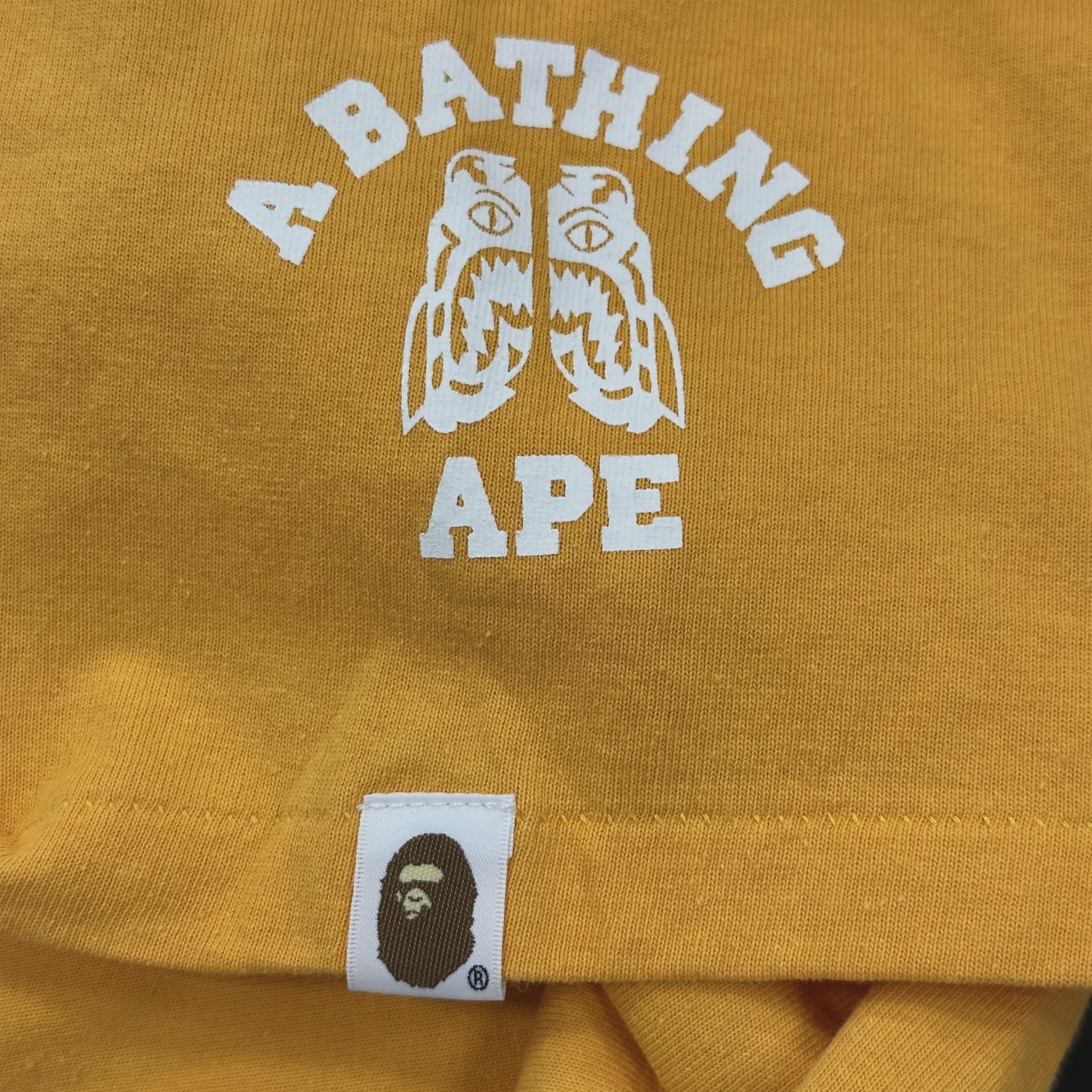 Bape orange tee • Pre-Owned [3365] 3
