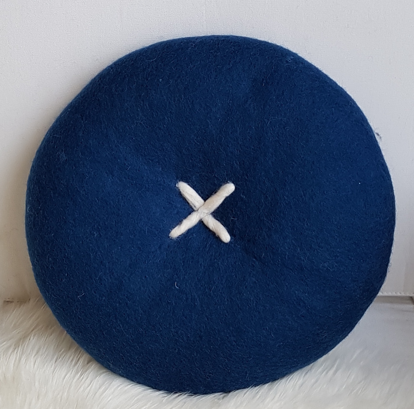 BUTTON CUSHION - PEACOCK