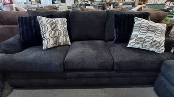 Derelly Black Sofa with throw pillows