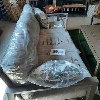 Plantation Key outdoor sofa granite with grey cushions