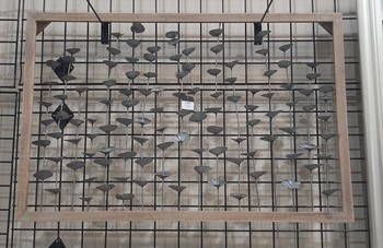 Wood framed metal leaves wall hanging