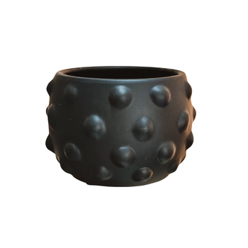 Zwarte stippen pot