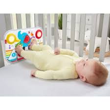 kick and play crib piano