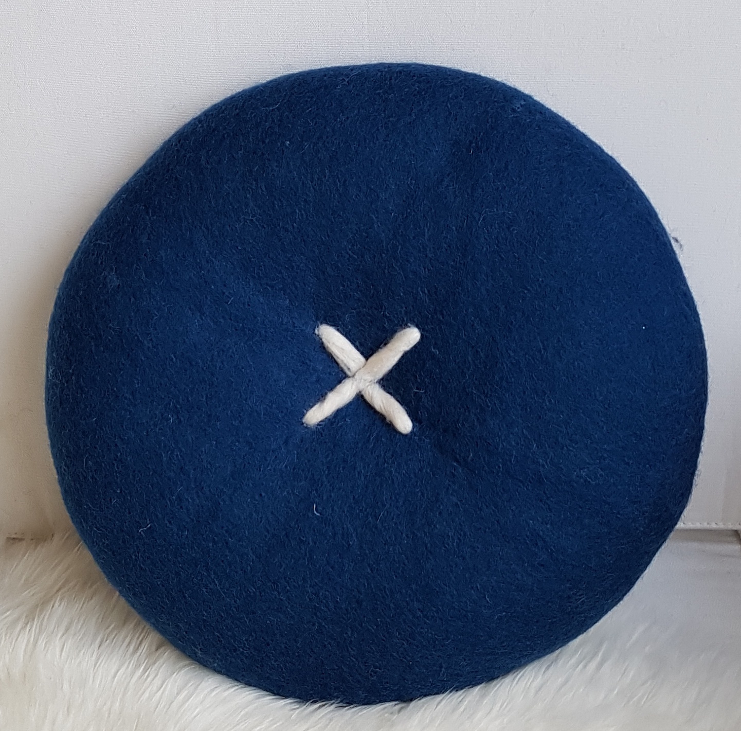 BUTTON CUSHION - PEACOCK